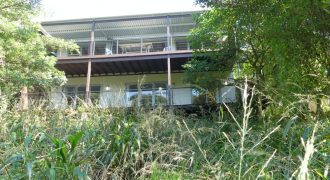 Stylish home nestled in the Dunkirk Estate Forest